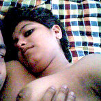Fourth pic of Busty Indian woman joins her man friend for foreplay on bed