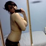 Second pic of Indian BBW takes self shots in a mirror while showing her huge breasts