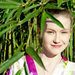 First pic of Sexy little geisha Emily Bloom spreading naked to show bald twat in the bamboo