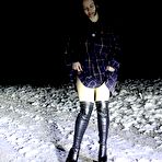 First pic of Caucasian girl Pinkycat pees on a snow-covered roadway at night in OTK boots