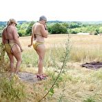 First pic of Old lesbians catch rays on their large breasts while sunbathing in a field