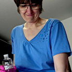 First pic of Amateur woman Hotmilf wears latex gloves while giving an oily handjob