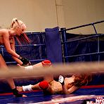 Fourth pic of Sporty lesbian chicks have some non nude catfight fun in the ring