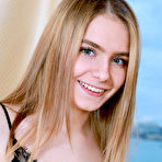 First pic of Beautiful blonde teen Dakota Pink discards a little black dress to pose nude