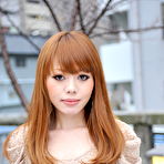 First pic of Hot Japanese girl with red hair Reika Kitahara poses outdoors in a short dress