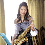 First pic of Japanese girl Kyoka Makimura exposes her breasts after holding a saxophone