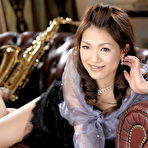 Second pic of Japanese girl Kyoka Makimura exposes her breasts after holding a saxophone