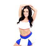 First pic of Dark-haired cheerleader Megan Rain works her phat ass while getting naked