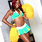 Second pic of Black-skinned cheerleader Bella Doll is dancing naked on the camera