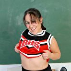 Third pic of Latina cheerleader flashes tits in classroom after a peek at upskirt panties