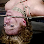 Fourth pic of White girl Darling squirts while being fingered during extreme bondage action