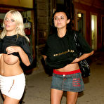 Third pic of Three girls flash their natural tits while walking a city street at night
