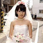 First pic of Beautiful Japanese bride Ruri Narumiya poses on the street during her big day