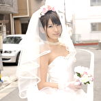 Second pic of Beautiful Japanese bride Ruri Narumiya poses on the street during her big day
