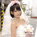 Third pic of Beautiful Japanese bride Ruri Narumiya poses on the street during her big day