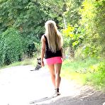 Fourth pic of Blonde chick Jena Lovely pisses on a pathway while out for a walk