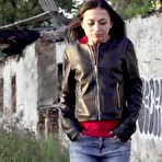 First pic of Petite brunette Natasha squats for a piss in a puddle on a gravel road