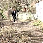 Fourth pic of Naomi Bennet squats for a badly needed pee on a path behind a building