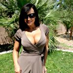 First pic of Shapely MILF Lisa Ann revealing superb boobs and ass outdoor