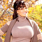 First pic of Mature brunette in glasses Lisa Ann reveals round tits & nice ass outdoors