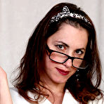 First pic of Over 30 lady Sophya Love gets naked in her office while wearing glasses