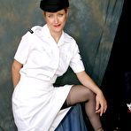 First pic of British nurse strips to her nylons and cap at the end of the work day