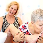 Second pic of Old lesbians lick each other feet before getting into the tub together