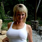 Third pic of Blonde amateur Jayme Lawrence slides panties aside to dildo after baring boobs