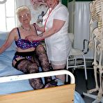 First pic of Redheaded nurse Valgasmic Exposed and a busty older lady play with a skeleton