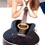 Third pic of Naughty Mag - Jackie Rogen - Skinny teen Jackie plucks a guitar and then fucks her pussy with her little fingers