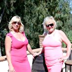 First pic of Mature blonde Melody releases an older woman's breasts from a pink dress