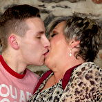 Third pic of Old lady with short hair is undressed after kissing her toy boy