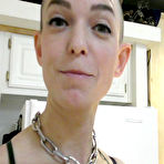 Fourth pic of Solo girl Abigail Dupree sports a buzz cut while making a salad in pretties