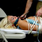 Second pic of Tied up and cleave gagged blonde girl is threatened with a knife