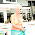 First pic of Mature wife Madison Milstar in bikini releases nice big tits by the pool