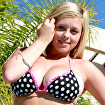 Fourth pic of Bikini babe Tegan Brady shows her busty stuff in the sun poolside