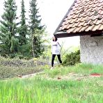 First pic of White girl Victoria Daniels pulls down black tights to pee outside of a chalet