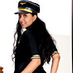 Second pic of 30 plus Latina chick Julie Ann peels off pilot uniform to pose nude in hosiery