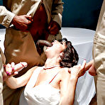 Second pic of MILF pornstar Veronica Avluv taking interracial gangbang in wedding dress