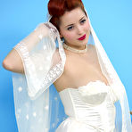 Third pic of Natural redhead Lucy V slips off her wedding dress to bare big natural tits