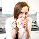 First pic of Young beauty Jolie gets totally naked over a cup of coffee in her kitchen
