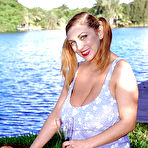 First pic of Chesty MILF pornstar Autumn Jade toying and masturbating bald cunt outside