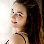 First pic of Sweet brunette teen Purr Simona goes nude in a garter belt and white nylons