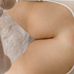 Third pic of Sweet brunette teen Purr Simona goes nude in a garter belt and white nylons