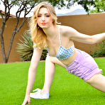 First pic of Skinny blonde Hailee displays her flexibility before masturbating in a yard