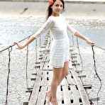 First pic of Petite girl Nensi gets totally naked while alone on a suspension bridge