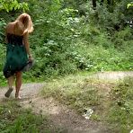 Fourth pic of Caucasian chick Chrissy Fox squats for a piss on a path through the woods