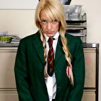 First pic of Blonde student exposes her bum for a caning from her female teacher