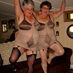 Fourth pic of Old women strip down to matching girdles before baring floppy tits and beavers