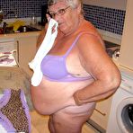 Third pic of Overweight British oma Grandma Libby exposes her boobs while ironing